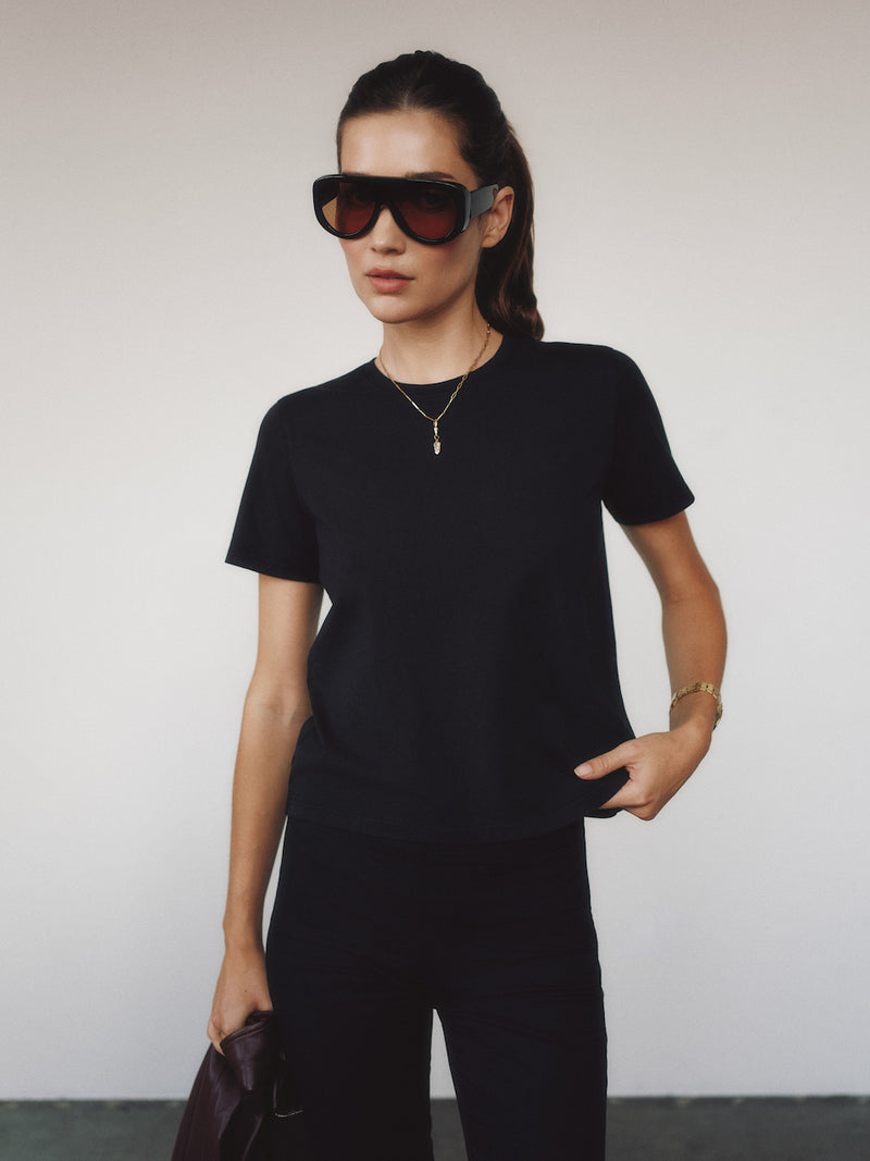 Model wearing the Best Friend tee in black.