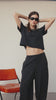 Video of models wearing the Black tee. 