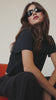 Video of a model wearing the Black tee.